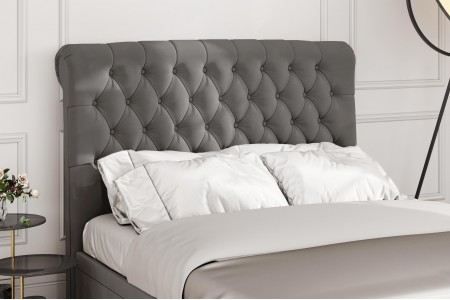 Sleigh chesterfield upholstered floor dtanding headboard | Magna