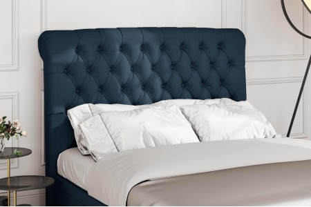 Sleigh chesterfield upholstered floor dtanding headboard | Magna